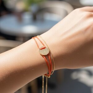 Delicate Gold Disc Bracelet with Orange Cord